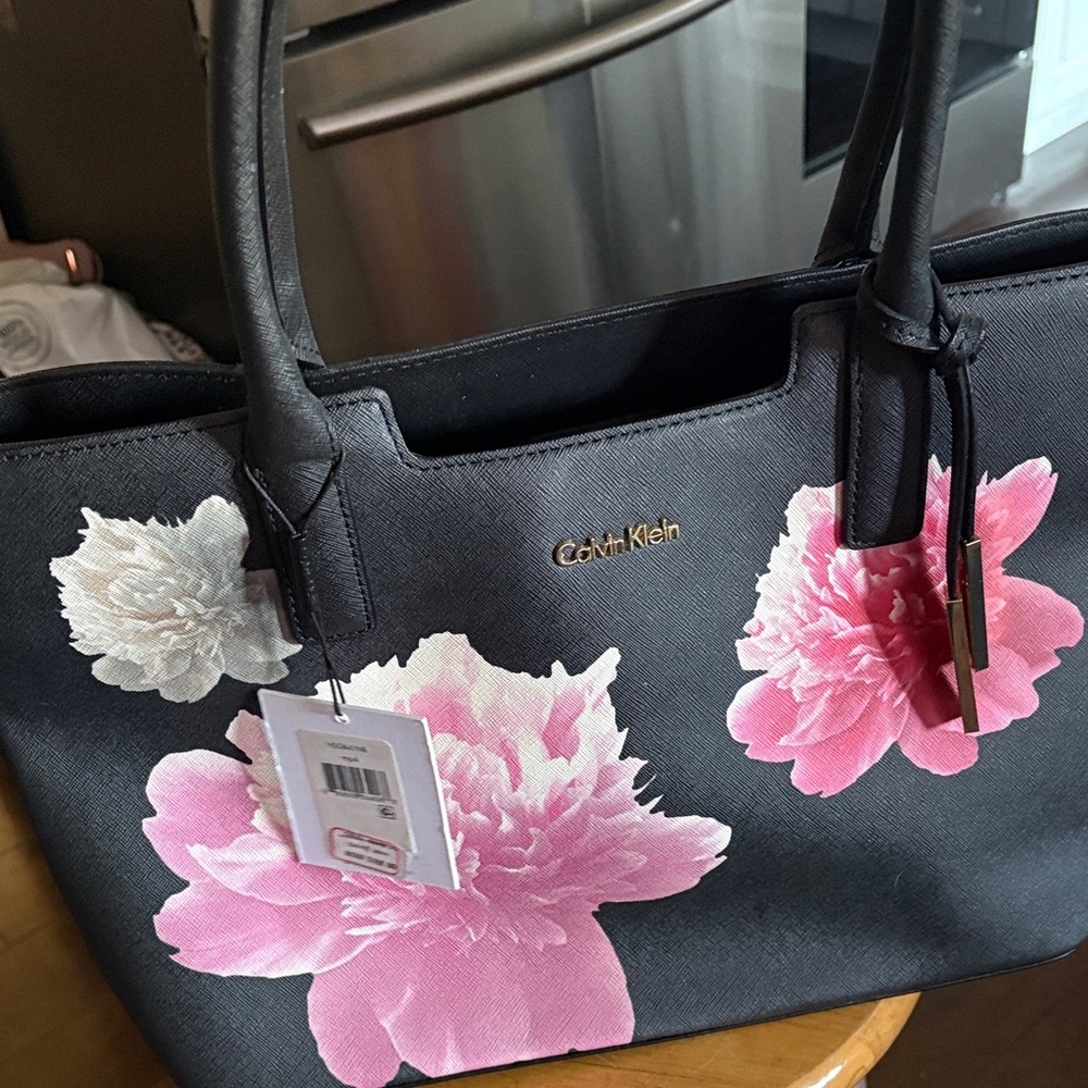 Calvin Klein Black Tote with Pink and White Floral Print cones with dust bag